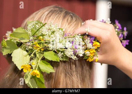 Songe d'une coiffure suédois traditionnel à une femme chef de cheveux. Banque D'Images