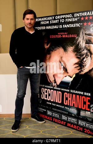 Nikolaj Coster-Waldau assiste à une séance photo pour son nouveau film, UNE deuxième chance, à l'hôtel Corinthia de Londres. Banque D'Images