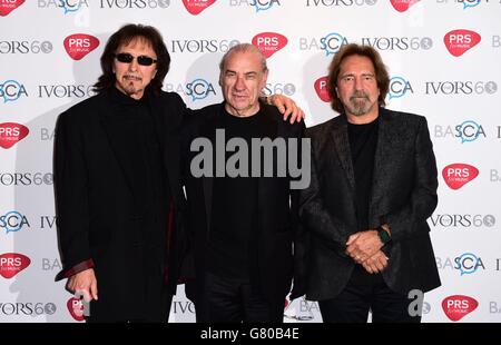 (Gauche-droite) Tony Iommi, Bill Ward et Geezer Butler du Black Sabbath arrivant pour le 60e prix annuel Ivor Novello, à la Grosvenor House à Londres. Banque D'Images