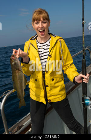 Catch & Cook à Rick Stein's cookery school à Padstow cornwall,,uk,où les élèves vont à la pêche puis filet et cuire leurs prises.a Banque D'Images