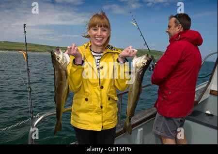 Catch & Cook à Rick Stein's cookery school à Padstow cornwall,,uk,où les élèves vont à la pêche puis filet et cuire leurs prises.a Banque D'Images