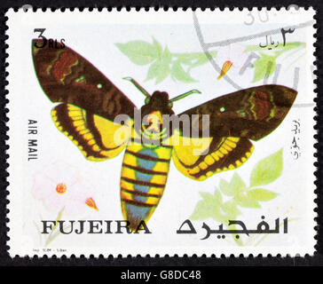 GROOTEBROEK ,les Pays-bas - MARS 20,2016 : timbres-poste ou de Fujairah Fujeira ca. 1967 montrant le dessin coloré d'une Banque D'Images