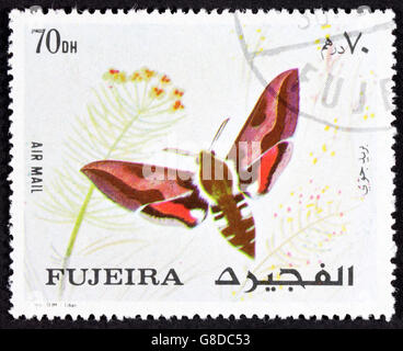 Grootebroek ,les Pays-Bas - mars 20,2016 : timbres-poste ou de fujairah fujeira ca. 1967 montrant le dessin coloré d'une Banque D'Images