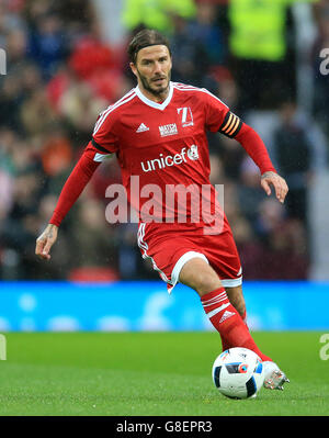 Grande-Bretagne et Irlande v reste du monde - UNICEF Charity Match - Old Trafford. David Beckham, le capitaine de la Grande-Bretagne et de l'Irlande Banque D'Images