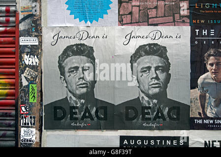 Un 'James Dean est mort' affiche sur un mur en Redchurch Street, Shoreditch, East London, UK. Banque D'Images