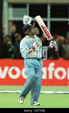 Cricket - coupe du monde ICC - Groupe A - Kenya / Inde. Sachin Tendulkar, en Inde, célèbre ses 100 points Banque D'Images