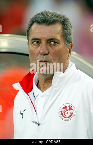 Football - coupe du monde de la FIFA 2006 Allemagne - Groupe H - Espagne / Tunisie - Gottlieb-Daimler-Stadion.Roger Lemerre, entraîneur tunisien Banque D'Images