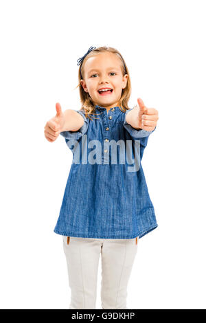 Studio Portrait of a cute blonde girl with Thumbs up, isolé en blanc Banque D'Images