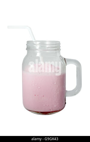 Lait rose en verre mug Banque D'Images