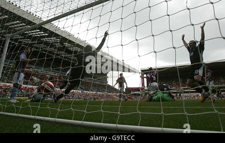 Emile Heskey de Wigan Athletic célèbre l'objectif d'ouverture de le match Banque D'Images