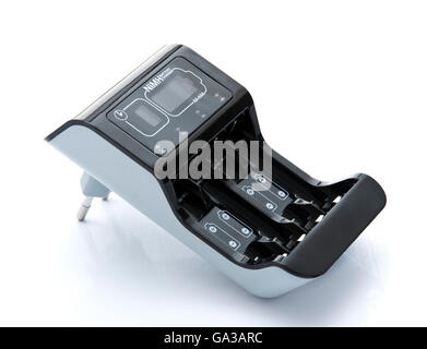 Chargeur de batterie avec indicateur isolé sur fond blanc Banque D'Images