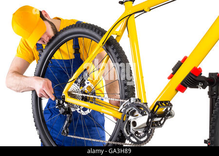 Mécanicien de vélos vtt jaune sur Banque D'Images