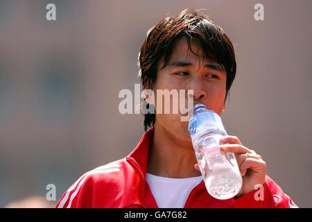 Football - Carlsberg Cup - China Training. Qi Hong, Chine Banque D'Images