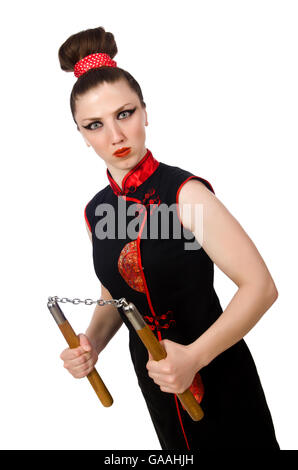 Femme drôle avec nunchucks isolated on white Banque D'Images