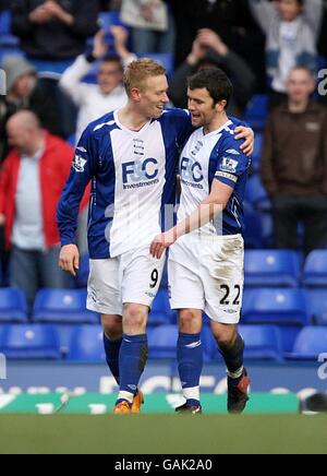 Mikael Forssell de Birmingham City célèbre son quatrième but Du jeu avec son coéquipier Damien Johnson (à droite) Banque D'Images