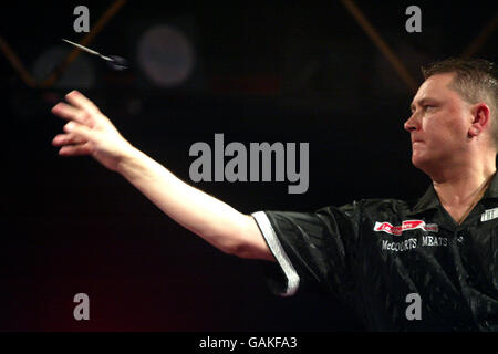 Kevin Painter sur son chemin vers la victoire sur Rutch Harding Banque D'Images
