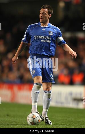 Football - Ligue des champions de l'UEFA - Premier tour Knockout - deuxième pied - Chelsea v Olympiakos - Stamford Bridge. John Terry, Chelsea Banque D'Images