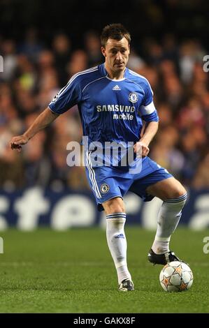 Football - Ligue des champions de l'UEFA - Premier tour Knockout - deuxième pied - Chelsea v Olympiakos - Stamford Bridge. John Terry, Chelsea Banque D'Images