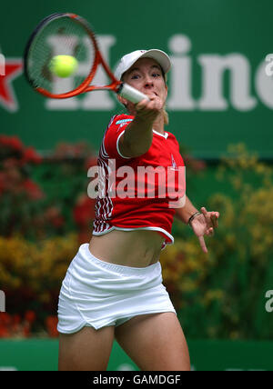 Tennis - Open d'Australie - troisième jour.Justine Henin-Hardenne (bel) en action contre Anna Kournikova (RUS). Banque D'Images