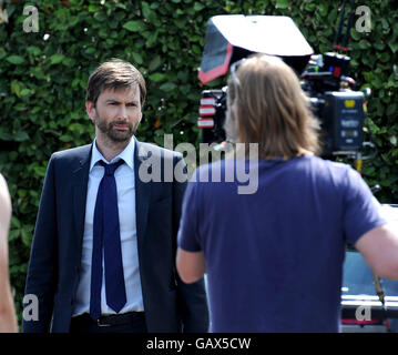 David Tennant de filmer une scène de la série finale de Broadchurch, Dorset, Angleterre, Royaume-Uni Banque D'Images