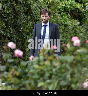 David Tennant de filmer une scène de la série finale de Broadchurch, Dorset, Angleterre, Royaume-Uni Banque D'Images