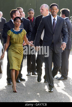 Will Smith et Jada Pinkett Smith arrivent à un dîner en l'honneur du 90e anniversaire de Nelson Mandela, à Hyde Park, dans le centre de Londres. Banque D'Images