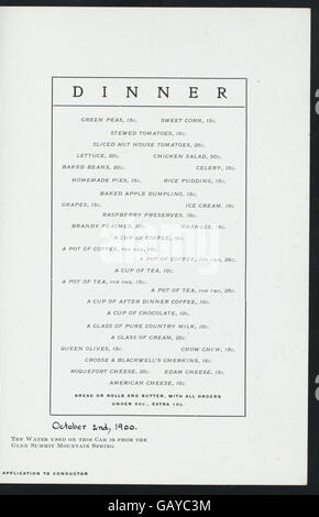 Un dîner organisé à bord du Black Diamond Express Dining car, exploité par le Lehigh Valley Railroad, offre probablement un dîner de luxe lors d'un voyage en train. Banque D'Images