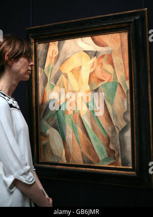 « Arlequin » de Pablo Picasso exposé à Sotheby's à Londres. La peinture (1894) devrait récupérer plus de 30 millions de dollars aux ventes automnale d'art impressionniste et moderne de Sotheby, les 3 et 5 novembre à New York. Banque D'Images