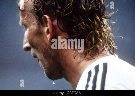 Football - coupe du monde Italia 1990 - finale - Argentine contre Allemagne de l'Ouest. Andreas Brehme, en Allemagne de l'Ouest, coule avec de la sueur Banque D'Images