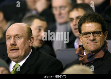 Football - UEFA Champions League - Premier Knockout Round - second Leg - Liverpool v Real Madrid - Anfield.Fabio Capello, directeur de l'Angleterre (à droite), et Brian Barwick, ancien directeur général de la FA, dans les tribunes Banque D'Images