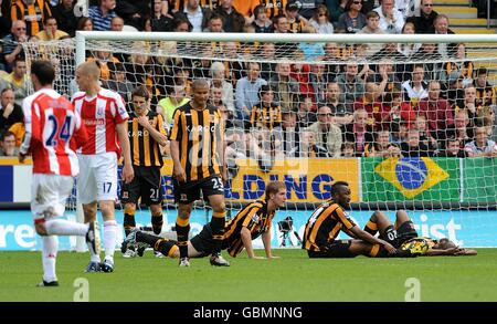 Les joueurs de Hull City sont déprimés après Ricardo Fuller de Stoke City marque le premier but de ses côtés Banque D'Images