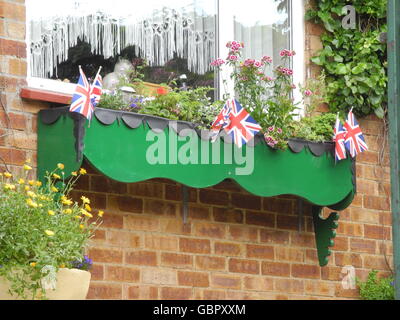 L'Essex, Royaume-Uni. 5 juillet, 2016. Drapeaux Union Jack dans une fenêtre de dialogue sur Wickford, Castle Point, en pays d'Essex, Royaume-Uni, le 5 juillet 2016. Photo : Teresa Peda/dpa/Alamy Live News Banque D'Images