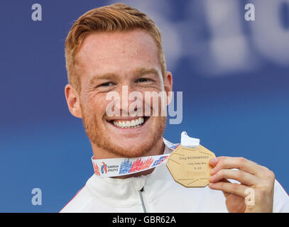 Amsterdam, Pays-Bas. 07Th Juillet, 2016. Greg Rutherford de Grande-bretagne affiche sa médaille d'or pour le saut à l'athlétisme au Stade olympique à Amsterdam, Pays-Bas, 07 juillet 2016. Photo : Michael Kappeler/dpa/Alamy Live News Banque D'Images