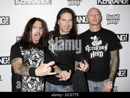 (De gauche à droite) Robb Flynn, Phil Demmel et Dave McClain de machine Head arrivant au Kerrang! Prix, à la Brasserie, Londres. Banque D'Images