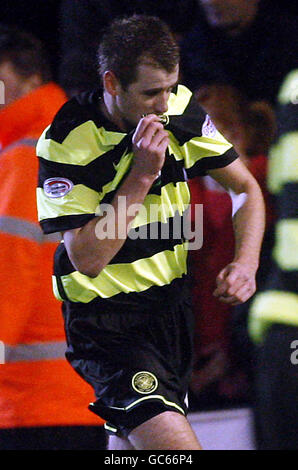 Niall McGinn du Celtic célèbre son but lors du match de la coupe Scottish FA quatrième tour au Cappielow Park, Greenock, Écosse. Banque D'Images