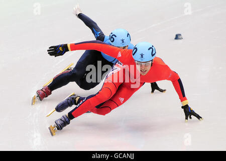 Jon Eley, de la Grande-Bretagne, en action pendant la finale du quart de patinage de vitesse sur piste courte de 500 m masculin à l'Oval olympique de Richmond, Vancouver, Canada. Banque D'Images