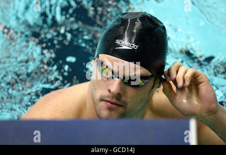 L'université de Loughborough et le Liam Tancock de Grande-Bretagne après avoir gagné sa chaleur dans l'événement de course de fond de 100 m de Mens Open le quatrième jour des championnats britanniques de natation de gaz 2010 à Ponds Forge, Sheffield Banque D'Images