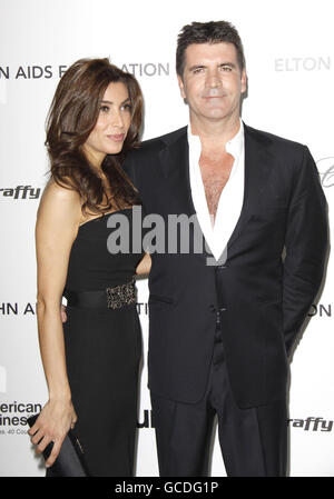 Simon Cowell et Mezhgan Hussainy arrivent pour la 18e édition annuelle du Elton John AIDS Foundation Party pour célébrer les 82e Academy Awards au Pacific Design Center de Los Angeles. Banque D'Images