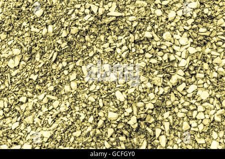 Jaune jaune grisâtre rugueux au sol en brique tourné principalement fond gris Banque D'Images