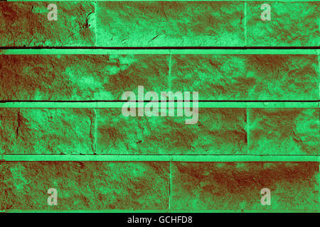 Lumière parfaite vert foncé verdâtre rougeâtre naturelle haute résolution de fond urbain mur de brique Banque D'Images