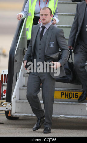 Wayne Rooney, en Angleterre, arrive à l'aéroport de Heathrow, à Londres. Banque D'Images