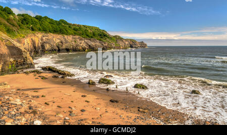 Une photo de l'HDR à Sandsend Beach, North Yorkshire Angleterre. Banque D'Images