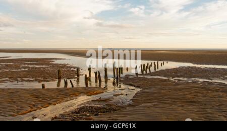 Soleil du soir à Camber Sands Kent Banque D'Images