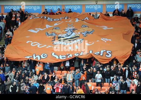 Football - Barclays Premier League - Blackpool / Everton - Bloomfield Road.Les fans tiennent une grande bannière Blackpool dans les stands Banque D'Images