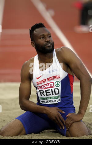 Amsterdam, Hollande. 10 juillet, 2016. Les Championnats d'Europe d'athlétisme. Julian Reid (GBR) avec son 3e triple saut pour les hommes lors de l'euro © Plus Sport Action/Alamy Live News Banque D'Images