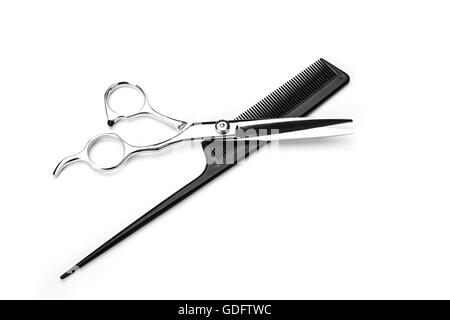 Outils de coiffure sur le fond blanc Banque D'Images