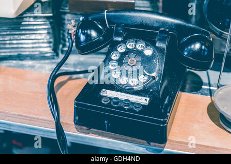 Vintage noir téléphone à cadran avec effet tonique Banque D'Images