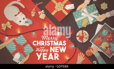 La préparation pour Noël cadeaux de la famille, bannière et unboxing décorations et chat jouant avec une boule de noël, vue du dessus Illustration de Vecteur