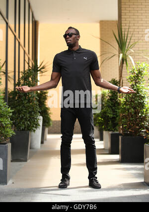 Usain Bolt pose en avant de sa conférence de presse à l'hôtel Grange Tower Bridge Hotel, Londres. Banque D'Images