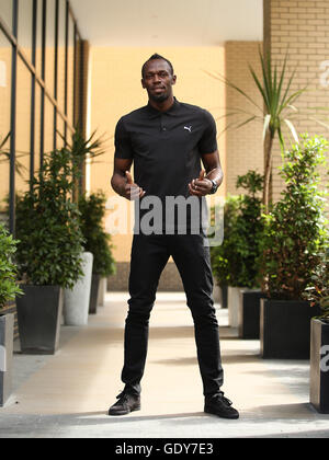 Usain Bolt pose en avant de sa conférence de presse à l'hôtel Grange Tower Bridge Hotel, Londres. Banque D'Images